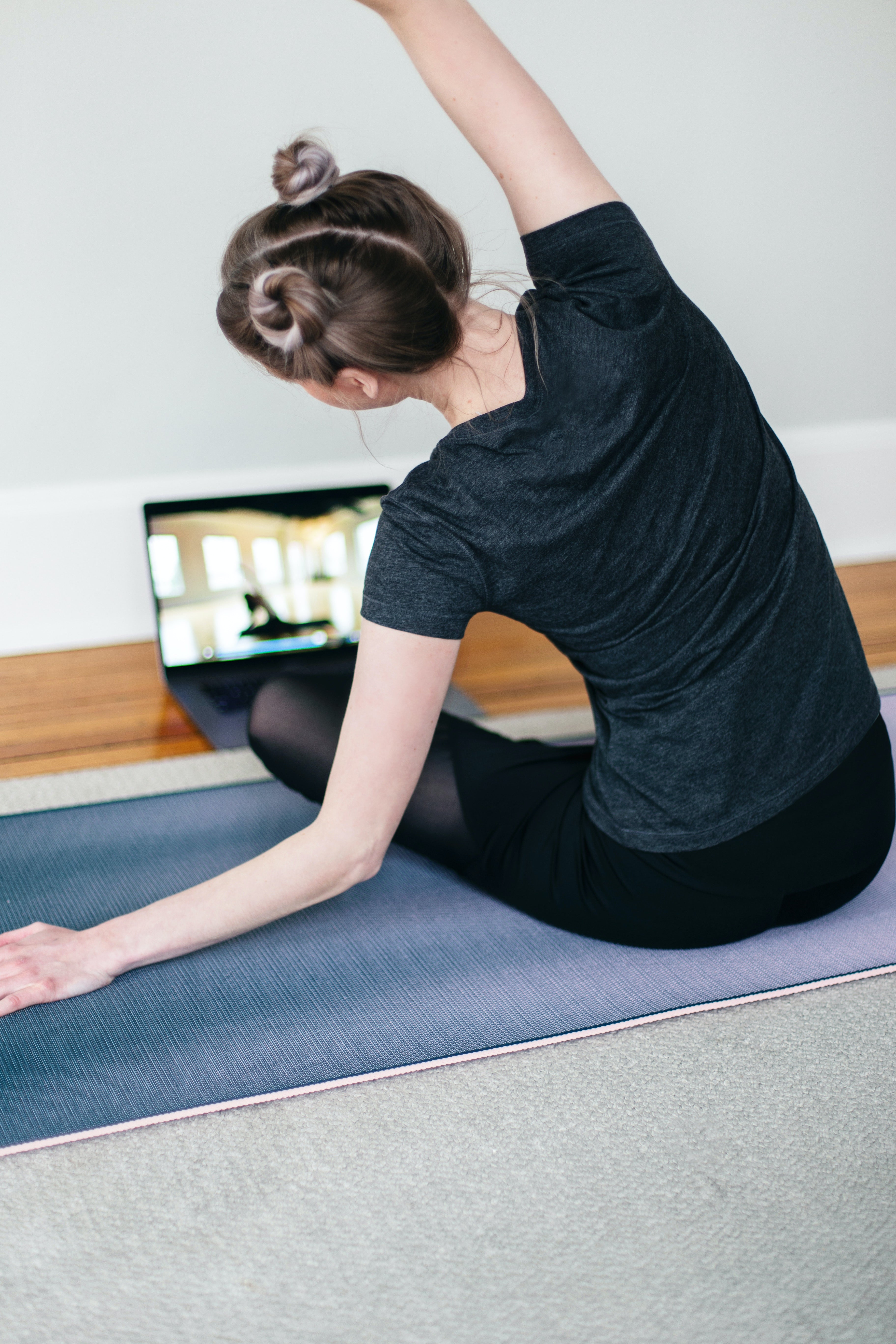 woman doing yoga at home